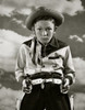 Boy in cowboy costume holding toy guns Poster Print - Item # VARSAL25512963B