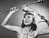 Close-up of a drum majorette performing with a twirling baton and smiling Poster Print - Item # VARSAL25524698