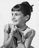 Close-up of a girl smiling with her hands clasped Poster Print - Item # VARSAL25514062