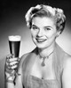 Portrait of a young woman holding a glass of beer Poster Print - Item # VARSAL2554233