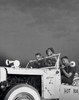 Low angle view of three teenage boys sitting in a vintage car Poster Print - Item # VARSAL2553187