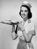 Portrait of a waitress holding a tray with a cup and saucer Poster Print - Item # VARSAL2556159