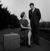 Young couple waiting at train station Poster Print - Item # VARSAL255416576B