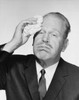 Portrait of a businessman wiping sweat from his forehead Poster Print - Item # VARSAL25512325
