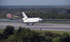 With drag chute unfurled space shuttle Discovery land on Runway 33 Shuttle Landing Facility Kennedy Space Center Florida - Item # VARPSTSTK203308S