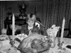 Girl praying before Thanksgiving meal Poster Print - Item # VARSAL255424928