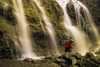 Time Delay Of Waterfall With Cyclist Carrying Bicycle PosterPrint - Item # VARDPI6138