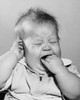 Close-up of a baby crying with it's fingers in it's mouth Poster Print - Item # VARSAL255624
