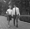 Students couple walking in park Poster Print - Item # VARSAL255418145