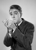 Studio portrait of young man igniting cigarette Poster Print - Item # VARSAL2556665