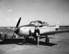 Businessman walking away from an airplane Poster Print - Item # VARSAL2553130B