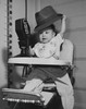 Baby sitting in a high chair Poster Print - Item # VARSAL2559704