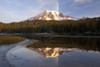 Washington, United States Of America; Reflection Of Mount Rainier In A Lake With Ice On The Surface In Mt. Rainier National Park PosterPrint - Item # VARDPI1876541
