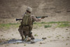 U.S. Marine prepares a high-explosive fragmentation round for the RPG-7 rocket-propelled grenade launcher in a wadi near Kunduz, Afghanistan Poster Print - Item # VARPSTTMO100302M