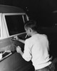 Rear view of a thief stealing a car Poster Print - Item # VARSAL25528246