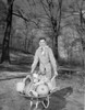 Woman with pumpkins on wheelbarrow Poster Print - Item # VARSAL255421954