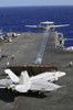 Pacific Ocean, December 24, 2011 - An E-2C Hawkeye launches from the flight deck of the Nimitz-class aircraft carrier USS Abraham Lincoln Poster Print - Item # VARPSTSTK105247M