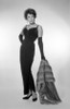 Young woman holding fur coat Poster Print - Item # VARSAL255417614