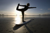 Silhouette Of Female Surfer Doing Bow Pulling Yoga Pose; Chesterman Beach Tofino Vancouver Island British Columbia Canada PosterPrint - Item # VARDPI1938899