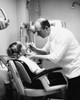 Side profile of a boy getting treatment from a dentist Poster Print - Item # VARSAL25525141