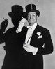 Young man holding a cigarette Poster Print - Item # VARSAL2553048