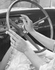 Mid section view of a woman driving a car Poster Print - Item # VARSAL25526556