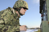 Seabee completes a generator check during a Command Post Exercise Poster Print - Item # VARPSTSTK107502M