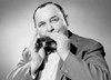 Portrait of man playing on harmonica Poster Print - Item # VARSAL255419677