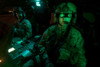 Pilots equipped with night vision goggles in the cockpit of a UH-60 Black Hawk helicopter at Davis Monthan Air Force Base, Arizona Poster Print - Item # VARPSTTMO100901M