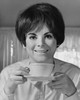 Portrait of a young woman holding a tea cup and saucer Poster Print - Item # VARSAL25512658B