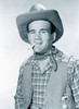 Studio portrait of cowboy smoking cigarette Poster Print - Item # VARSAL255417260