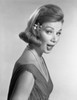 Surprised elegant woman looking at camera  studio shot Poster Print - Item # VARSAL255417403