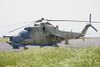 An Mi-35 attack helicopter operated by the Afghan National Army Air Corp at Kunduz Airfield, Northern Afghanistan Poster Print - Item # VARPSTTMO100487M