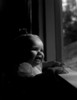 Baby girl looking out of window Poster Print - Item # VARSAL2559407