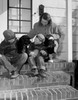 Children sitting with dog on steps Poster Print - Item # VARSAL255416205