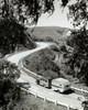 High angle view of a camper attached to a truck moving on a road  Solvang  California  USA Poster Print - Item # VARSAL2553697