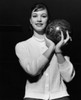 Young adult woman holding a bowling ball Poster Print - Item # VARSAL25522463