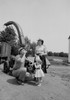 Parents with daughter drinking milk on farm Poster Print - Item # VARSAL255422711