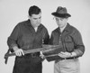 Two architects discussing a blueprint Poster Print - Item # VARSAL25525134