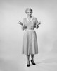 Mature woman smiling and gesturing Poster Print - Item # VARSAL25542038