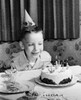 Boy sitting in front of a birthday cake Poster Print - Item # VARSAL2553214