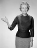 Gesturing mature woman  studio shot Poster Print - Item # VARSAL25548987