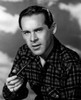 Studio portrait of man holding tobacco pipe Poster Print - Item # VARSAL25549367