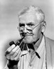 Portrait of senior man with pipe  studio shot Poster Print - Item # VARSAL25549373