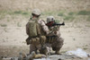U.S. Marines prepare a high-explosive fragmentation round for the RPG-7 rocket-propelled grenade launcher in a wadi near Kunduz, Afghanistan Poster Print - Item # VARPSTTMO100315M