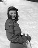 Young woman holding ski poles and smiling Poster Print - Item # VARSAL2553839