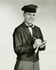 Portrait of a delivery person writing on a note pad Poster Print - Item # VARSAL2553602
