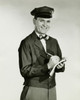 Portrait of a delivery person writing on a note pad Poster Print - Item # VARSAL2553602
