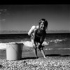 Girl playing on beach Poster Print - Item # VARSAL255422414