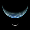 Artist's depiction of an Earth-like planet in deep space with an orbiting moon illuminated by a nearby sun Poster Print - Item # VARPSTMRC200053S